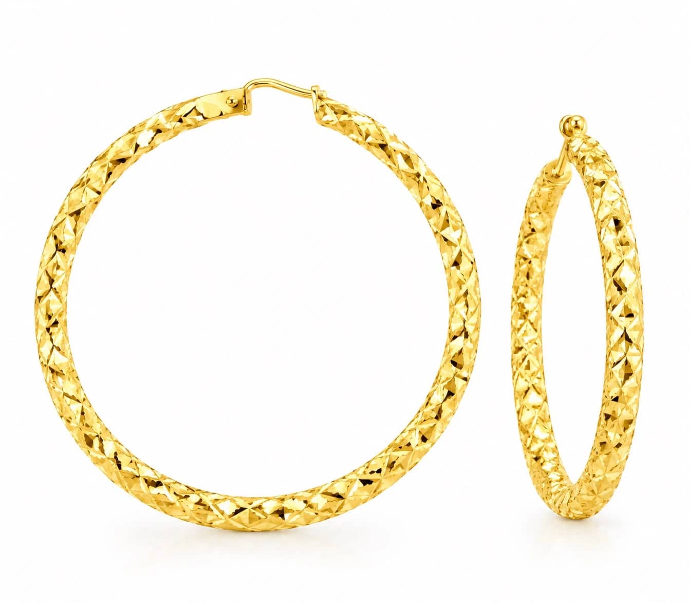 Bold gold hoop earrings with an all-over diamond-cut pattern