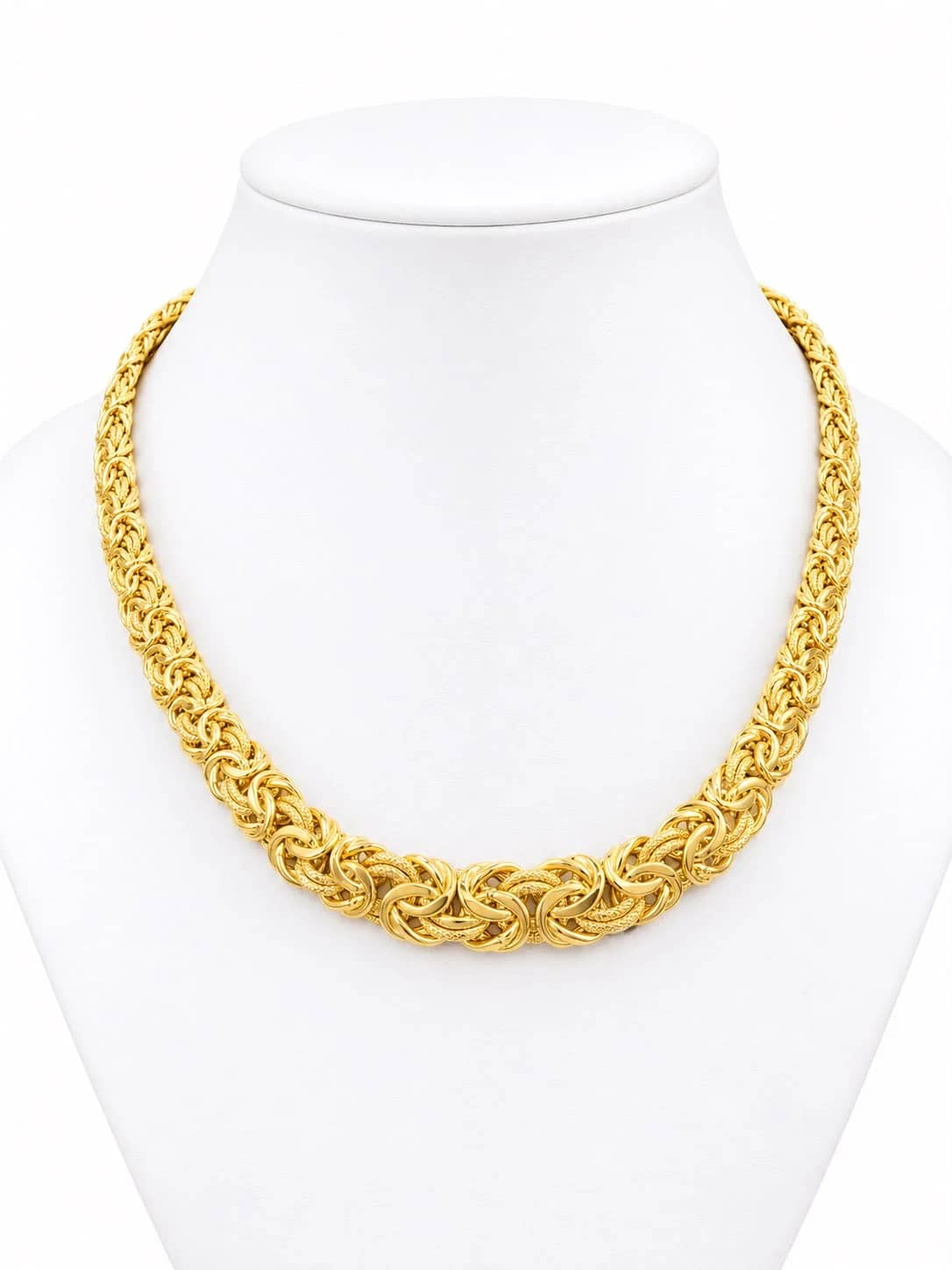 Graduated gold Byzantine necklace on a white bust